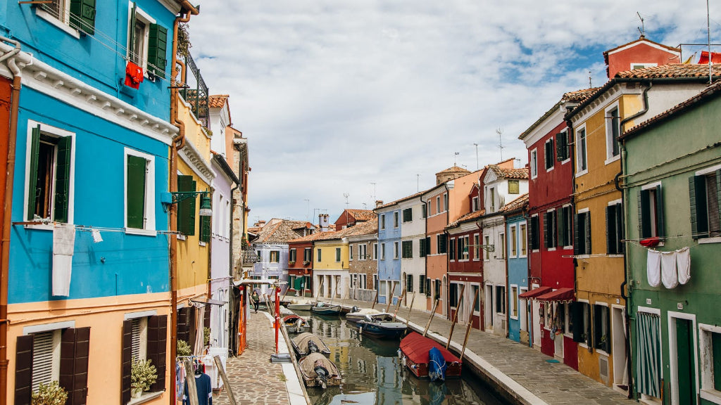 Colorful buildings along a canal in Burano, Italy
