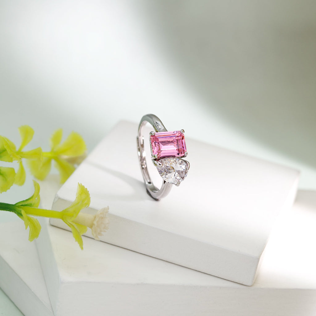 The Heart of Verona dual stone ring featuring a pink emerald cut stone and heart shaped zircon by Kohizen